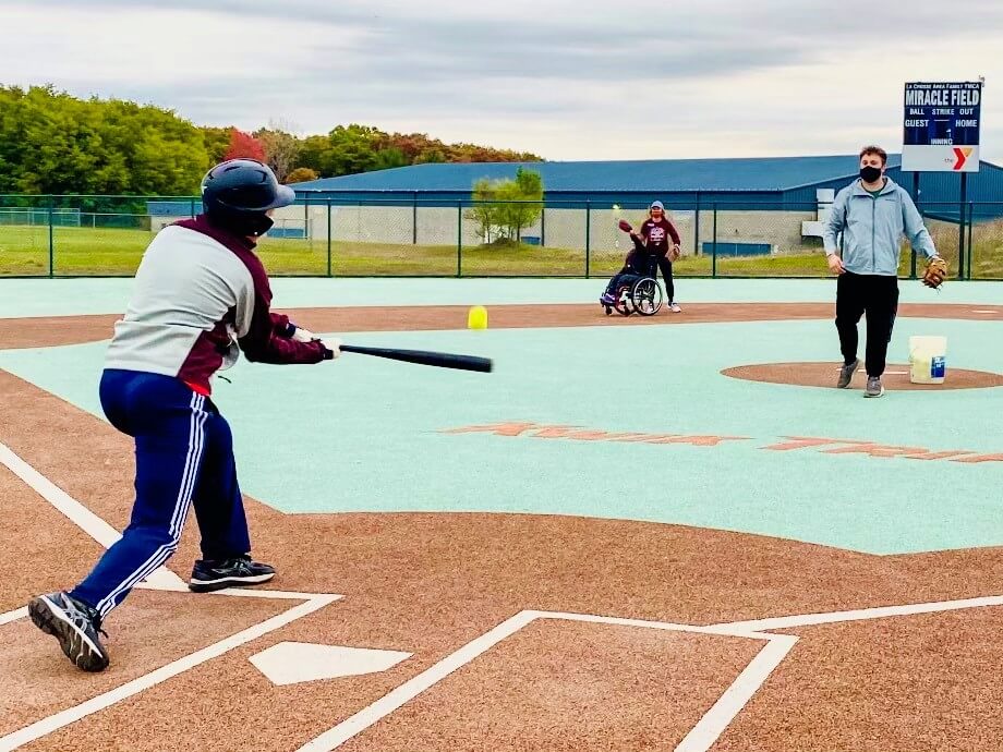 A local Miracle Leaguer swings the bat