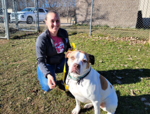 Coulee Region Humane Society Executive Director Heather Drievold with Nikki, a dog who's available for adoption